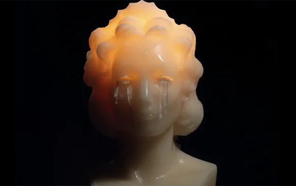 Bust shaped candle.