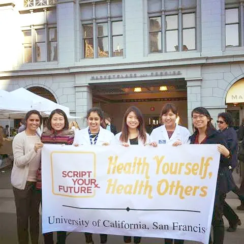 UCSF students holding a Script Your Future banner
