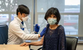 Administering a vaccination.