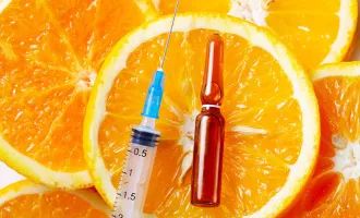 Oranges, syringe and ampule.