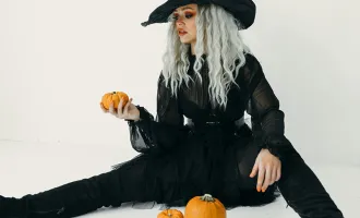 Woman in witch costume.