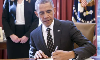 Obama signing document 