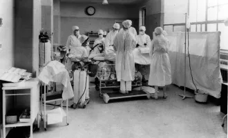 Surgery in UC Hospital operating room, 1924.