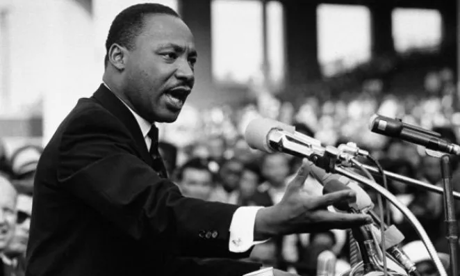 Martin Luther King junior delivering a speech.