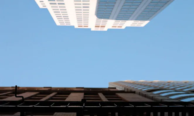 Top of skyscrapers from street level.