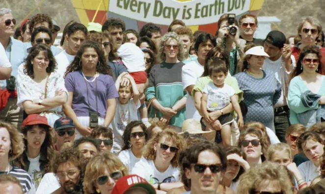 Crowd gathered at a 1990 Earth Day event.