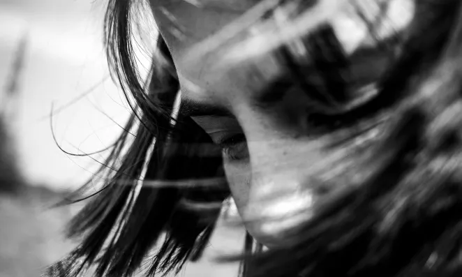 Close up of woman's face thinking