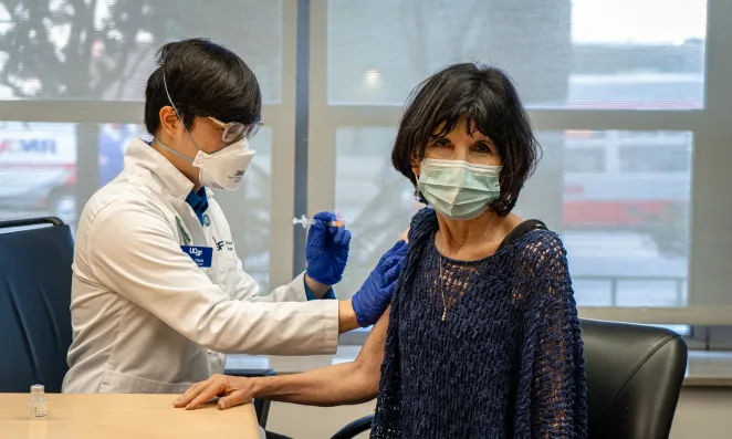 Administering a vaccination.