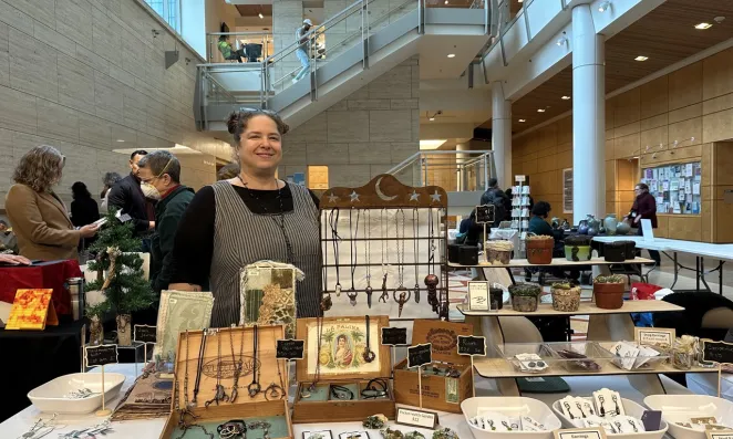 Brandee Woleslagle Blank shows off her wares at the Artisan Guild by the Bay winter handmade market on Dec. 6 at Mission Bay Genentech Hall Atrium.