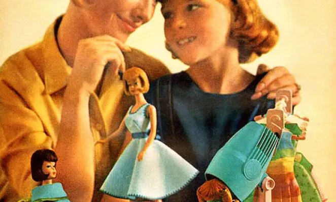 Mother and daughter and barbie dolls.
