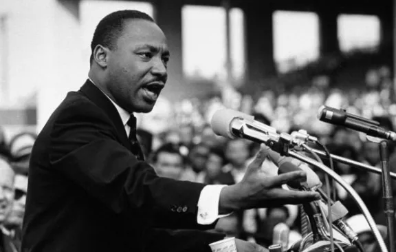 Martin Luther King junior delivering a speech.