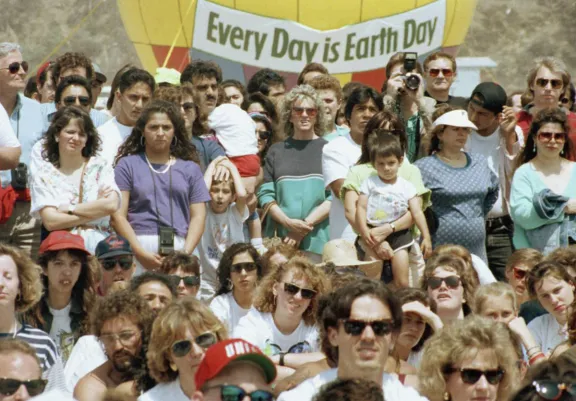 Crowd gathered at a 1990 Earth Day event.