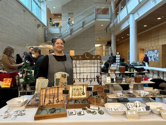 Brandee Woleslagle Blank shows off her wares at the Artisan Guild by the Bay winter handmade market on Dec. 6 at Mission Bay Genentech Hall Atrium.