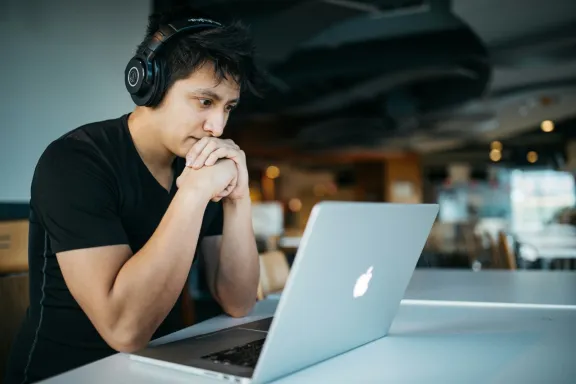 Student sitting in front of laptop