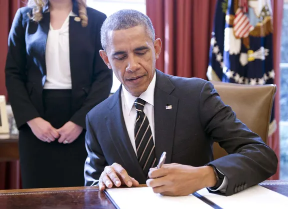 Obama signing document 