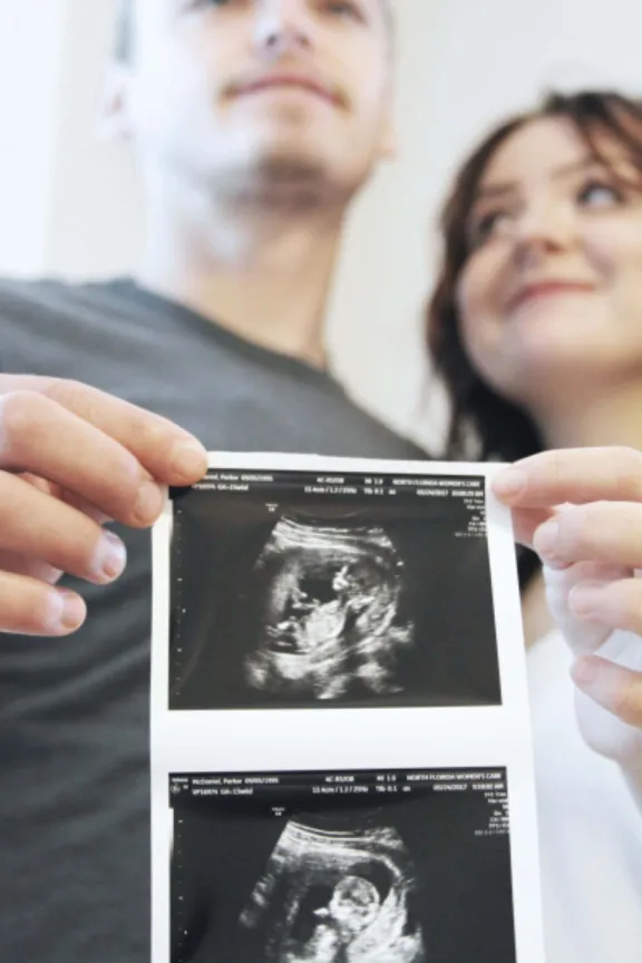 couple with baby sonogram